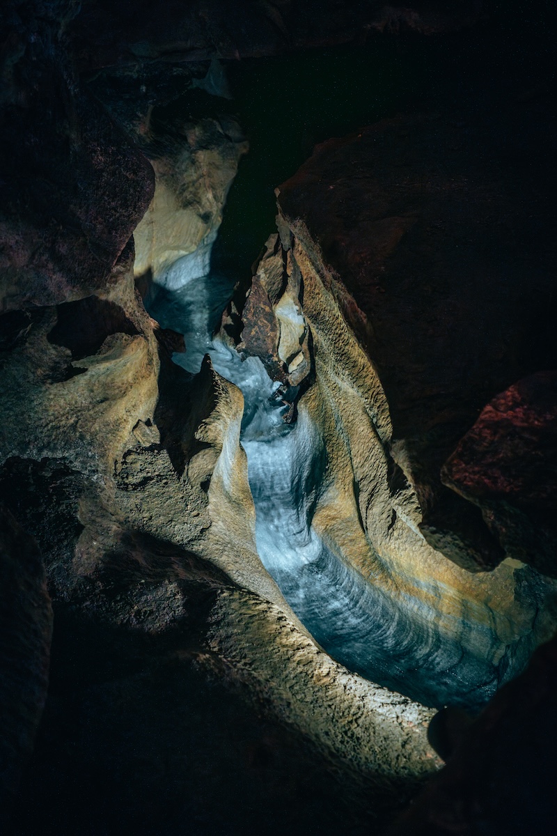 Rushing Creek inside Crystal Cave with a marble bottom