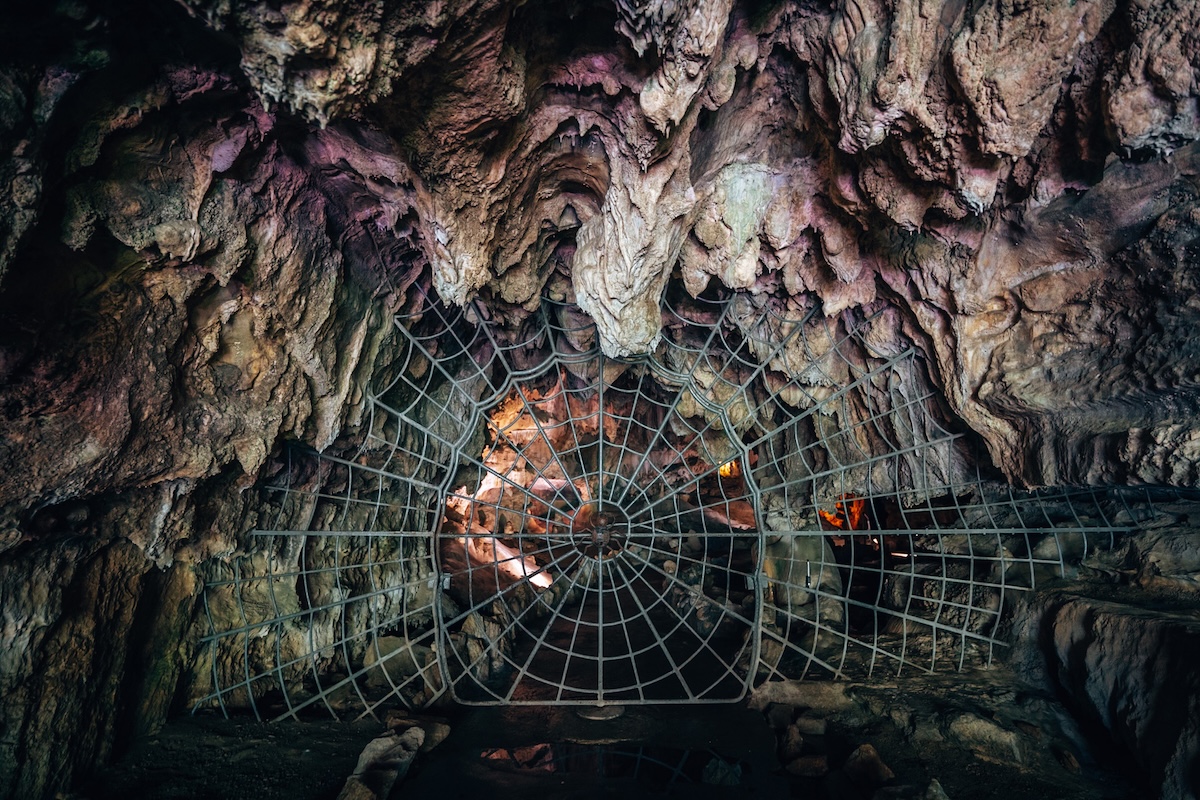 CRYSTAL CAVE SPIDER-WEB ENTRANCE GATE